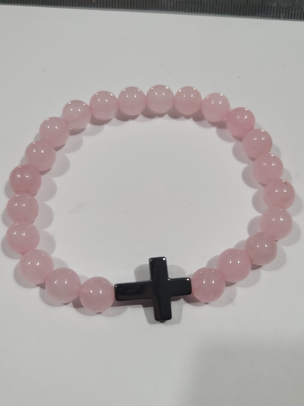 Pink Beaded Stretch Bracelet with Black Cross Accent